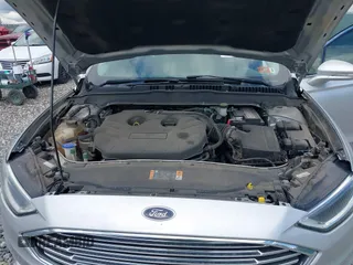 2017 Ford Fusion Titanium with VIN 3FA6P0K99HR112234, listed as a IAAI auction lot 42332700 with 106,685 mi miles and . Bid and sale history available at DreamBid. Image 10.