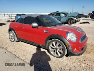 2012 MINI Coupe S z VIN WMWSX3C56CT408371, wystawiony jako Copart lot #73730514 z przebiegiem 95 786 mil mil oraz Szkody całkowita. Historia ofert i sprzedaży dostępna na DreamBid. Obrazek 4.