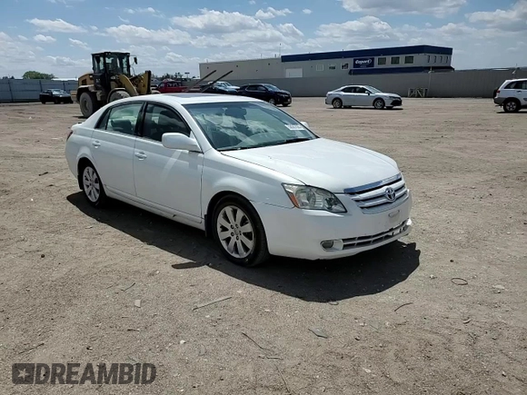 2005 Toyota Avalon XL z VIN 4T1BK36B25U061701, wystawiony jako Copart lot #58007825 z przebiegiem 207 885 mil mil oraz Szkoda całkowita • Salvage title. Historia ofert i sprzedaży dostępna na DreamBid. Obrazek 13.