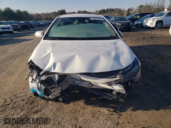 2021 Toyota Corolla Hybrid LE with VIN JTDEAMDE5MJ011169, listed as a Copart auction lot 88752265 with 52,994 mi miles and Salvage Title. Bid and sale history available at carsss.com. Image 5.