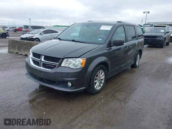 2019 Dodge Grand Caravan SXT with VIN 2C4RDGCG3KR543221, listed as a IAAI auction lot 41528859 with 129,778 mi miles and . Bid and sale history available at DreamBid. Image 2.