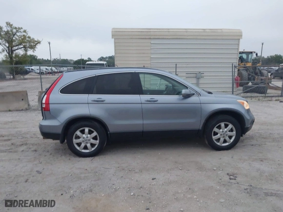 2009 Honda CR-V EX-L with VIN JHLRE387X9C006124, listed as a IAAI auction lot 41757092 with 142,038 mi miles. Bid and sale history available at carsss.com. Image 13.