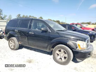 2004 Dodge Durango SLT with VIN 1D4HD48N04F211932, listed as a Copart auction lot 80087524 with 244,552 mi miles and Salvage title. Bid and sale history available at DreamBid. Image 4.