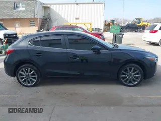 2018 Mazda 3 Touring with VIN 3MZBN1L30JM247097, listed as a IAAI auction lot 41803062 with 61,345 mi miles. Bid and sale history available at carsss.com. Image 13.