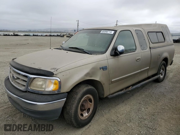 2000 Ford F-150 XL with VIN 1FTRX17L3YKB07018, listed as a Copart auction lot 66998714 with 0 mi miles and Salvage Title. Bid and sale history available at carsss.com. Image 1.
