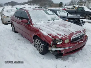 2003 Jaguar X-Type 2.5L Manual with VIN SAJEA51D63XC89273, listed as a IAAI auction lot 41298544 with 124,400 mi miles and . Bid and sale history available at DreamBid. Image 1.