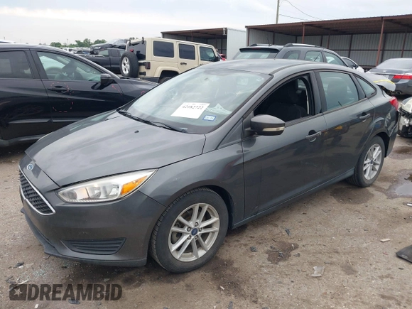 2017 Ford Focus SE z VIN 1FADP3F23HL325751, wystawiony jako IAAI lot #42182722 z przebiegiem 46 119 mil mil oraz . Historia ofert i sprzedaży dostępna na DreamBid. Obrazek 2.