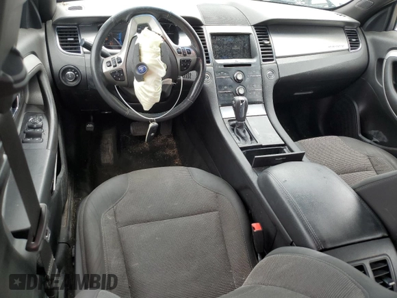 2017 Ford Taurus SEL with VIN 1FAHP2E84HG118540, listed as a Copart auction lot 61239644 with 93,596 mi miles and Salvage Title. Bid and sale history available at DreamBid. Image 8.