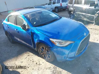 2019 Toyota Yaris L z VIN 3MYDLBYV2KY509439, wystawiony jako IAAI lot #41604366 z przebiegiem 111 058 mil mil oraz . Historia ofert i sprzedaży dostępna na DreamBid. Obrazek 1.