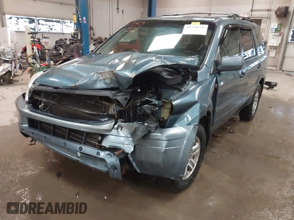 2005 Honda Pilot EX-L with RES with VIN 2HKYF18615H515907, listed as a IAAI auction lot 41520756 with 172,939 mi miles. Bid and sale history available at carsss.com. Image 6.