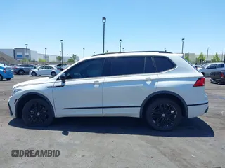 2022 Volkswagen Tiguan SE R-Line Black with VIN 3VVCB7AX3NM073218, listed as a IAAI auction lot 42254388 with 31,998 mi miles and . Bid and sale history available at DreamBid. Image 14.