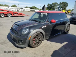 2013 MINI Hardtop John Cooper Works with VIN WMWSU9C59DT379445, listed as a Copart auction lot 58664035 with 153,433 mi miles and Clean title. Bid and sale history available at DreamBid. Image 1.