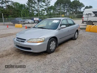 1999 Honda Accord LX z VIN 1HGCG5649XA025825, wystawiony jako IAAI lot #42162173 z przebiegiem 199 809 mil mil oraz . Historia ofert i sprzedaży dostępna na DreamBid. Obrazek 2.