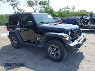 2019 Jeep Wrangler Sport S z VIN 1C4GJXAG2KW664395, wystawiony jako IAAI lot #42683888 z przebiegiem 72 742 mil mil oraz . Historia ofert i sprzedaży dostępna na DreamBid. Obrazek 1.
