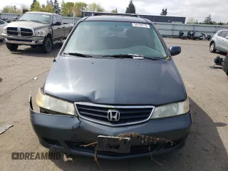 2003 Honda Odyssey EX-L z VIN 5FNRL18053B123100, wystawiony jako Copart lot #54159715 z przebiegiem 232 206 mil mil oraz Szkoda całkowita • Salvage title. Historia ofert i sprzedaży dostępna na DreamBid. Obrazek 5.