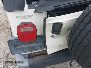 2005 Jeep Wrangler Unlimited with VIN 1J4FA44S65P368475, listed as a IAAI auction lot 42484636 with Not provided miles and . Bid and sale history available at DreamBid. Image 6.