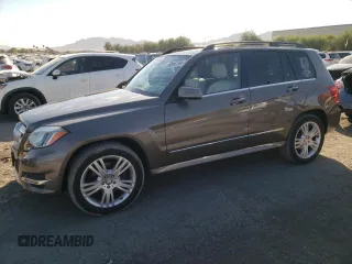 2014 Mercedes-Benz GLK 350 with VIN WDCGG5HB6EG311261, listed as a Copart auction lot 76586194 with 128,269 mi miles and Salvage Title. Bid and sale history available at DreamBid. Image 1.