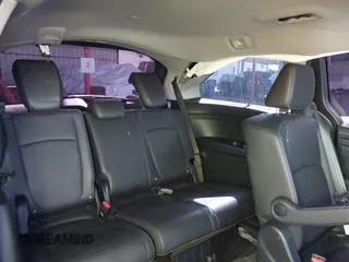 2024 Honda Odyssey Touring with VIN 5FNRL6H82RB027601, listed as a IAAI auction lot 41808680 with 25,911 mi miles and . Bid and sale history available at DreamBid. Image 8.