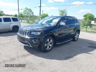 2014 Jeep Grand Cherokee Overland with VIN 1C4RJECG8EC417995, listed as a IAAI auction lot 41959550 with 155,029 mi miles. Bid and sale history available at carsss.com. Image 2.