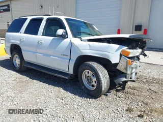 2003 GMC Yukon SLT with VIN 1GKEC13Z33R171861, listed as a IAAI auction lot 41739226 with 230,139 mi miles. Bid and sale history available at carsss.com. Image 1.
