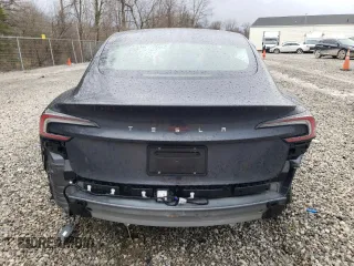 2024 Tesla Model 3 with VIN 5YJ3E1EA7RF858716, listed as a Copart auction lot 49809325 with 9,936 mi miles and Non Repairable. Bid and sale history available at DreamBid. Image 6.