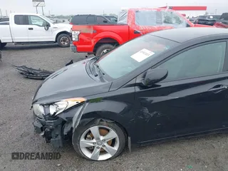 2013 Hyundai Elantra Limited z VIN 5NPDH4AE7DH371094, wystawiony jako IAAI lot #41912413 z przebiegiem 159 685 mil mil oraz . Historia ofert i sprzedaży dostępna na DreamBid. Obrazek 13.