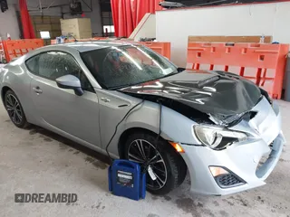 2013 Scion FR-S z VIN JF1ZNAA12D2730675, wystawiony jako IAAI lot #42321319 z przebiegiem 83 074 mil mil oraz . Historia ofert i sprzedaży dostępna na DreamBid. Obrazek 1.