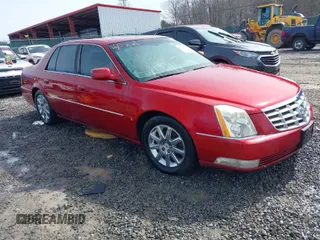 2009 Cadillac DTS w/1SA with VIN 1G6KD57Y09U103322, listed as a IAAI auction lot 41628247 with 115,723 mi miles. Bid and sale history available at carsss.com. Image 1.