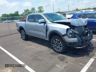2024 Ford Ranger Lariat with VIN 1FTER4KH8RLE29047, listed as a IAAI auction lot 42669512 with 14,525 mi miles and . Bid and sale history available at DreamBid. Image 1.
