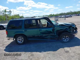 1998 Ford Explorer XLT z VIN 1FMZU32EXWUC84059, wystawiony jako IAAI lot #42260114 z przebiegiem 173 383 mil mil oraz . Historia ofert i sprzedaży dostępna na DreamBid. Obrazek 13.