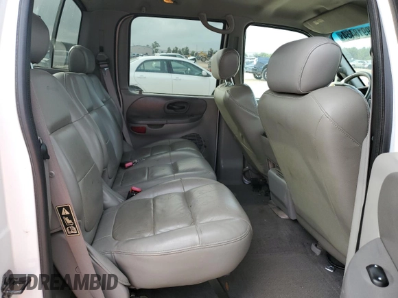 2001 Ford F-150 XLT with VIN 1FTRW07L01KC60815, listed as a Copart auction lot 87022424 with 205,304 mi miles and Salvage title. Bid and sale history available at DreamBid. Image 11.