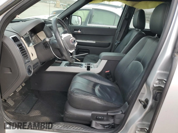 2008 Mercury Mariner with VIN 4M2CU91Z58KJ15755, listed as a Copart auction lot 50168565 with 130,883 mi miles and Salvage Title. Bid and sale history available at carsss.com. Image 7.