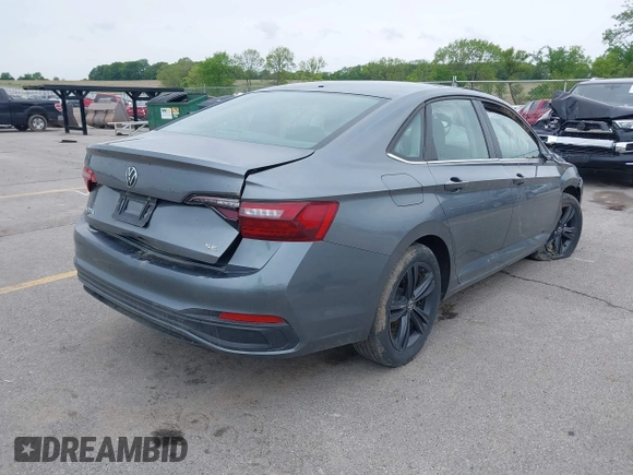 2022 Volkswagen Jetta SE with VIN 3VW7M7BU5NM000413, listed as a IAAI auction lot 42326437 with 61,385 mi miles and . Bid and sale history available at DreamBid. Image 4.