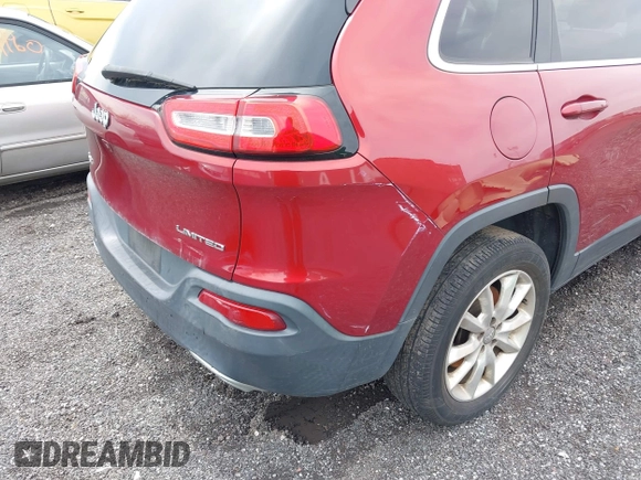 2015 Jeep Cherokee Limited with VIN 1C4PJMDS4FW544604, listed as a IAAI auction lot 41961706 with Not Provided miles and . Bid and sale history available at DreamBid. Image 17.