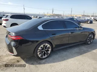 2024 BMW 5 Series 530i with VIN WBA43FJ09RCS15203, listed as a Copart auction lot 42549495 with 22,920 mi miles and Salvage title. Bid and sale history available at DreamBid. Image 3.