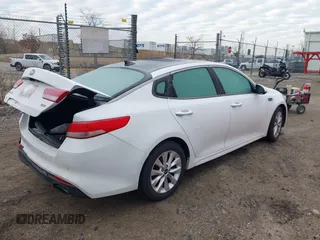 2016 Kia Optima EX with VIN 5XXGU4L31GG027250, listed as a IAAI auction lot 41881343 with 135,635 mi miles. Bid and sale history available at carsss.com. Image 4.