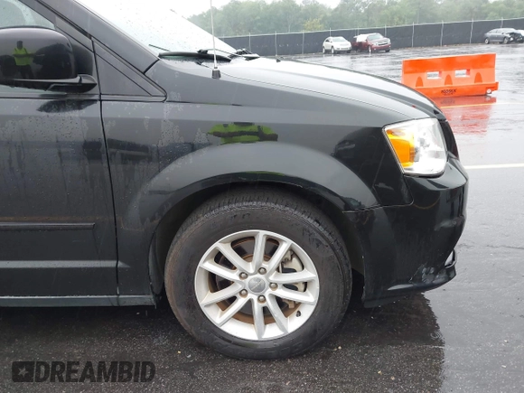 2015 Dodge Grand Caravan SXT with VIN 2C4RDGCG8FR556861, listed as a IAAI auction lot 42224948 with 110,797 mi miles and . Bid and sale history available at DreamBid. Image 12.