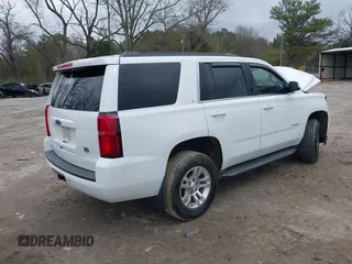 2020 Chevrolet Tahoe LT with VIN 1GNSKBKC2LR253012, listed as a IAAI auction lot 41870002 with 127,789 mi miles and . Bid and sale history available at DreamBid. Image 4.