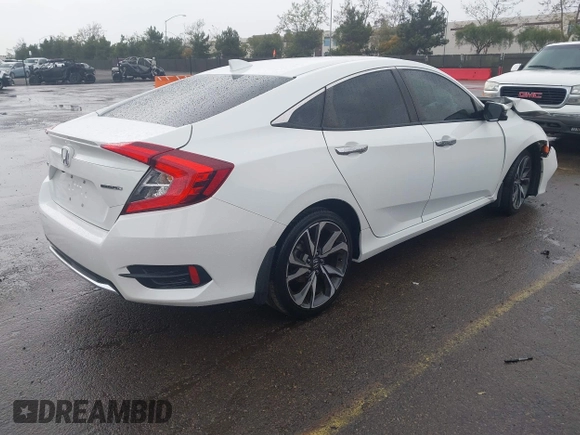 2020 Honda Civic Sedan Touring with VIN 19XFC1F91LE210390, listed as a IAAI auction lot 41766652 with 67,269 mi miles. Bid and sale history available at carsss.com. Image 4.