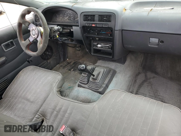 1995 Nissan Frontier XE with VIN 1N6SD11Y2SC308065, listed as a Copart auction lot 45282595 with 51,994 mi miles and Salvage title. Bid and sale history available at DreamBid. Image 8.