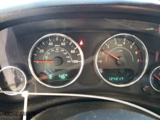 2011 Jeep Wrangler Unlimited Sahara with VIN 1J4BA5H15BL635016, listed as a Copart auction lot 84433444 with 124,217 mi miles and Salvage Title. Bid and sale history available at carsss.com. Image 9.