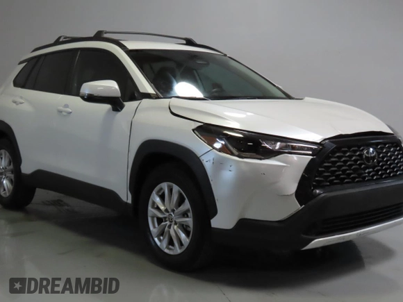 2023 Toyota Corolla Cross LE with VIN 7MUCAAAG2PV052111, listed as a Copart auction lot 64481675 with 18,125 mi miles and Salvage title. Bid and sale history available at DreamBid. Image 1.