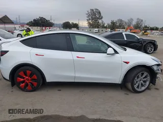 2021 Tesla Model Y Long Range with VIN 5YJYGDEE0MF209045, listed as a IAAI auction lot 41762738 with 24,721 mi miles. Bid and sale history available at carsss.com. Image 14.