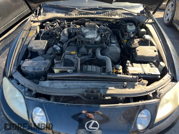 1995 Lexus SC 400 z VIN JT8UZ30CXS0041496, wystawiony jako Copart lot #80837114 z przebiegiem 62 010 mil mil oraz Tytuł czysty. Historia ofert i sprzedaży dostępna na DreamBid. Obrazek 7.