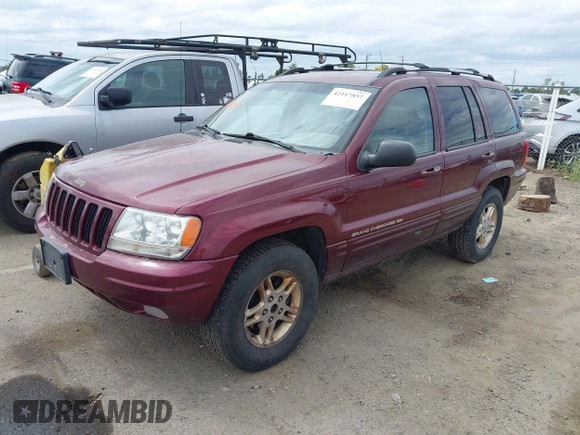 1999 Jeep Grand Cherokee Limited with VIN 1J4GW68N3XC696825, listed as a IAAI auction lot 42117857 with 236,300 mi miles. Bid and sale history available at carsss.com. Image 2.
