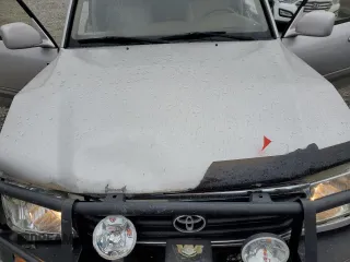 1999 Toyota Land Cruiser z VIN JT3HT05J6X0064313, wystawiony jako Copart lot #49555315 z przebiegiem 177 814 mil mil oraz Szkoda całkowita • Salvage title. Historia ofert i sprzedaży dostępna na DreamBid. Obrazek 12.