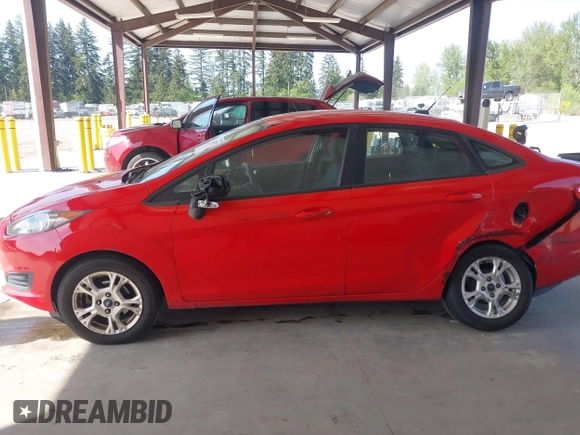 2014 Ford Fiesta SE with VIN 3FADP4BJ1EM210630, listed as a IAAI auction lot 42117897 with 102,553 mi miles and . Bid and sale history available at DreamBid. Image 14.