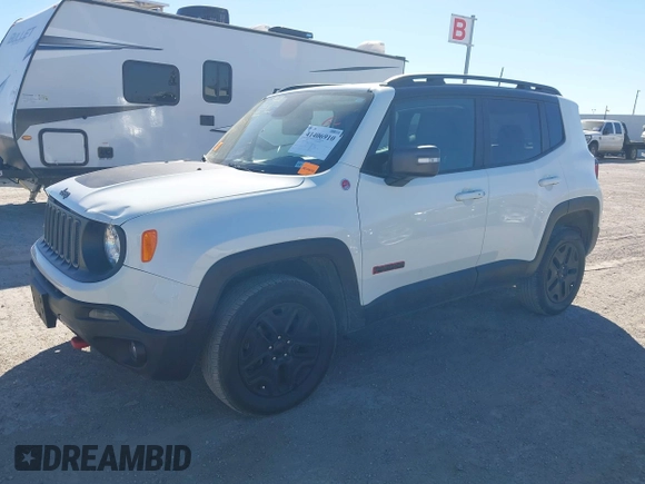 2018 Jeep Renegade Trailhawk with VIN ZACCJBCB1JPH28490, listed as a IAAI auction lot 41406910 with 76,003 mi miles. Bid and sale history available at carsss.com. Image 2.
