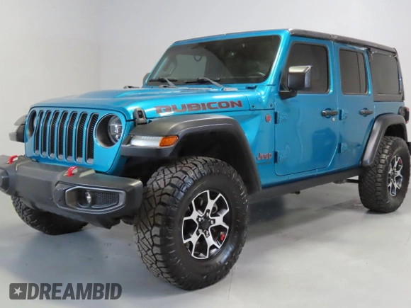 2020 Jeep Wrangler Unlimited Rubicon z VIN 1C4HJXFG0LW141133, wystawiony jako Copart lot #59150925 z przebiegiem 61 973 mil mil oraz Szkoda całkowita • Salvage title. Historia ofert i sprzedaży dostępna na DreamBid. Obrazek 2.