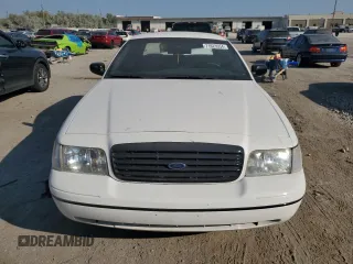 1999 Ford Crown Victoria Police with VIN 2FAFP71W7XX156457, listed as a Copart auction lot 71623954 with 123,313 mi miles and Salvage Title. Bid and sale history available at carsss.com. Image 5.